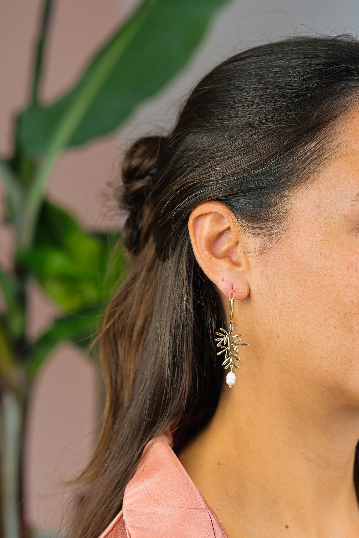 Asymmetrical pearl and leaf earrings