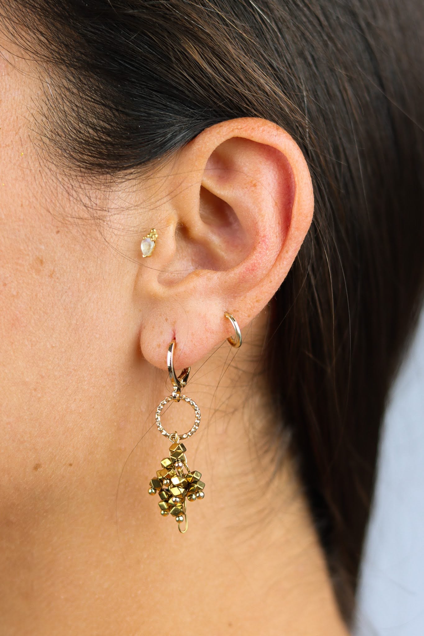 Stay Gold by Mme Bovary asymmetrical hematite earrings