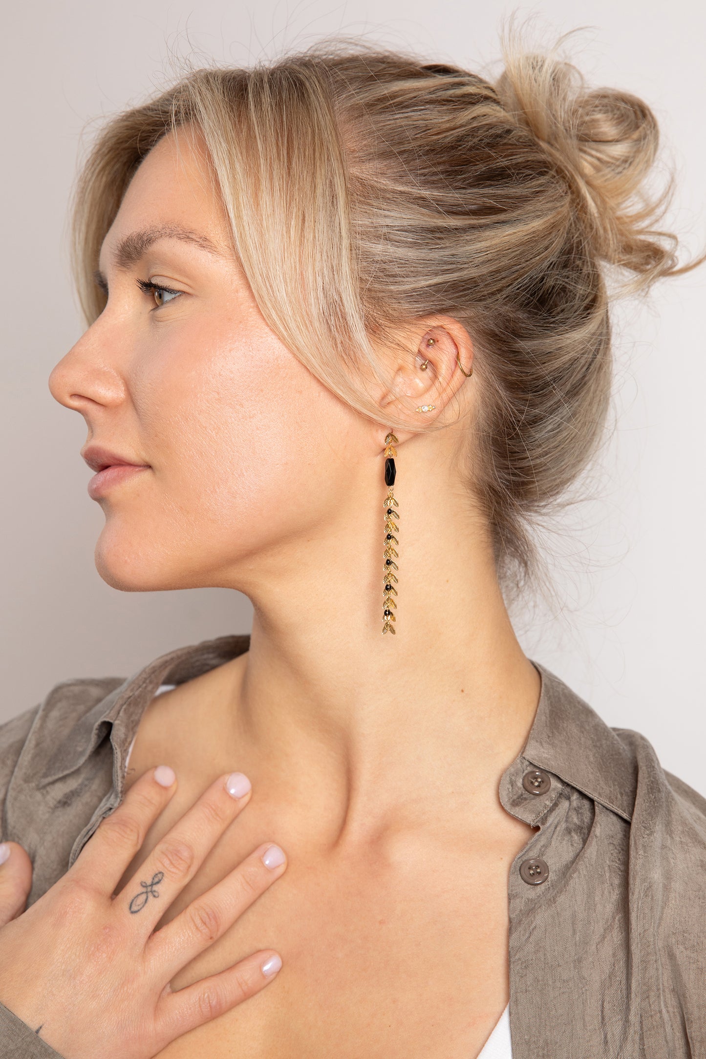 Asymmetrical chevron onyx stud earrings