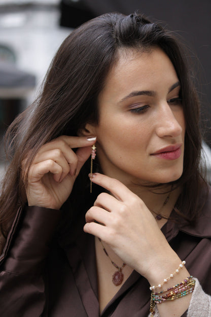 Delicate dangling earrings with fine pink opal crystals and two thin drop chains for subtle facial contouring