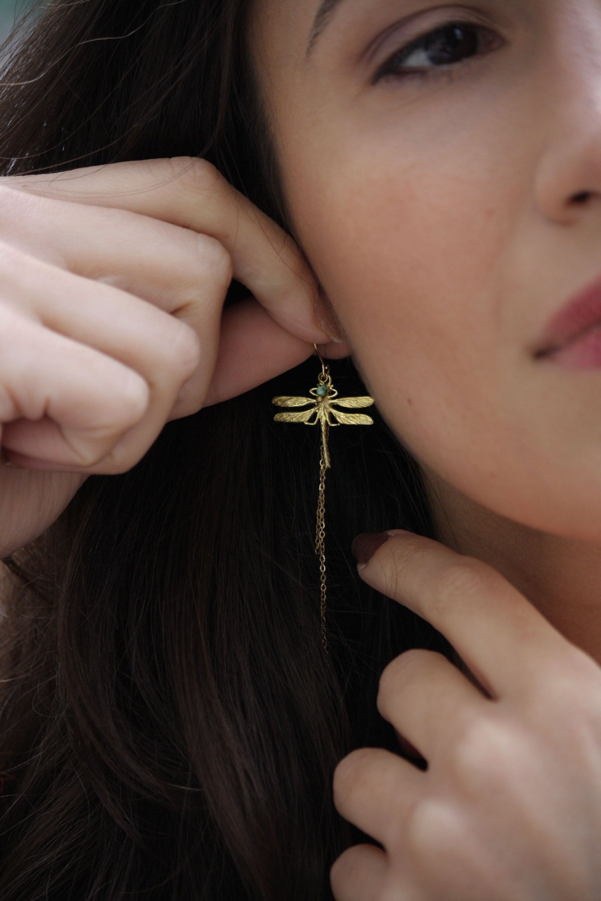 Delicate dragonfly dangling earrings with two fine drop chains for subtle facial contouring