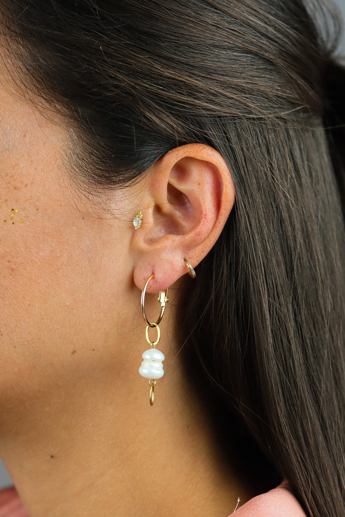Asymmetrical pearl and leaf earrings