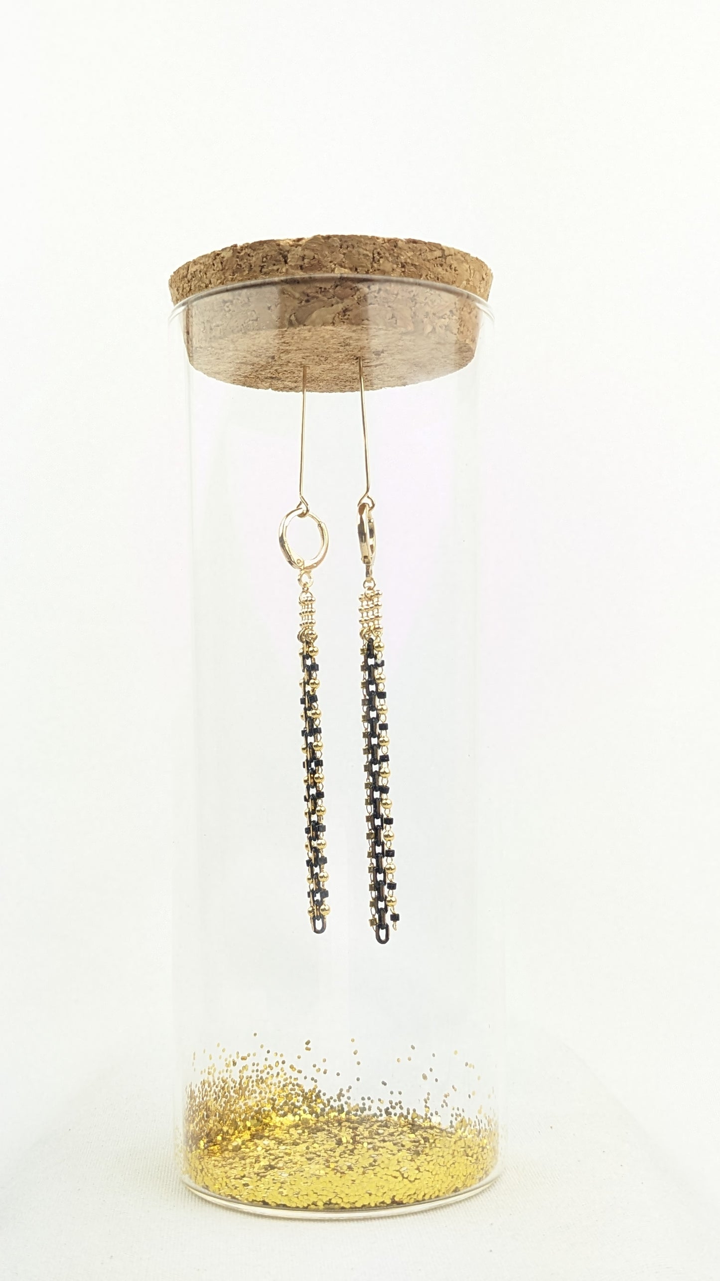 Black and gold plated dangling earrings