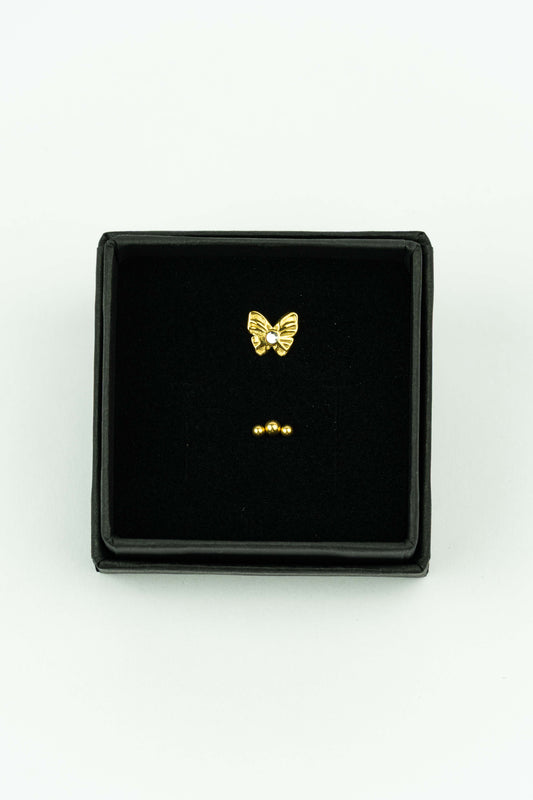 Beautiful set of 2 tiny stud earrings.

A beautiful detailed butterfly and a minimalist 3 dot inspired design.

The earrings are made out of stainless steel and handpicked by Stay Gold Antwerp atelier in the center of the city, just next to the cathedral of Antwerp.

hypoallergenic

The stud earrings are aprox 4mm.

Giftwrapped in a beautiful Stay Gold Antwerp box.