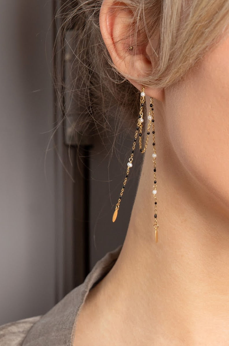 lange wit zwarte chandelier steker oorbellen in stainless steel