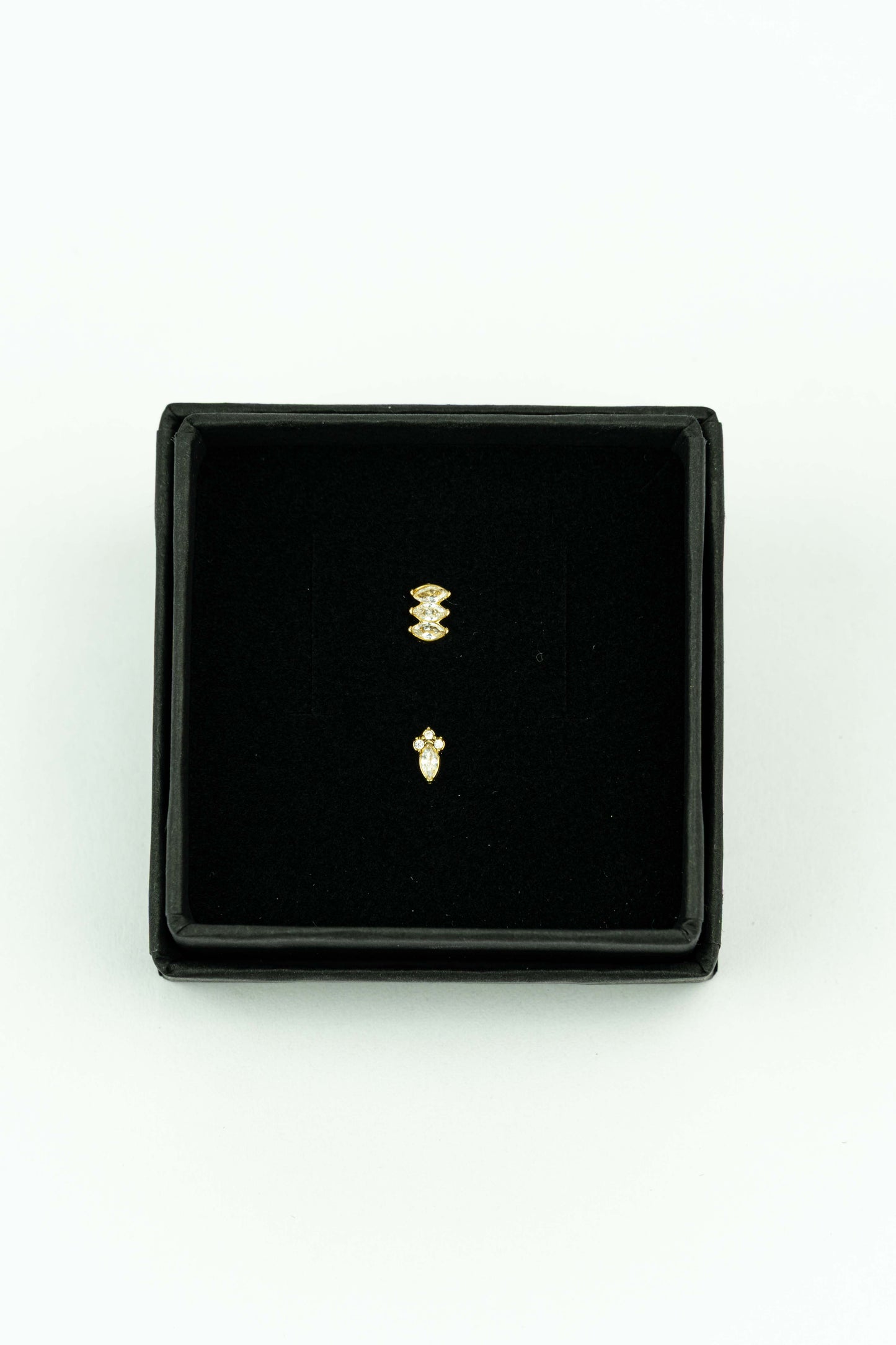 Zirkonia inspired diamond shaped and dagger goldplated stainless stud ideal for mix &amp; match.

Handpicked by our Stay Gold Antwerp atelier in the center of the city, just next to the cathedral of Antwerp.

Hypoallergenic

Giftwrapped in a beautiful Stay Gold Antwerp box.