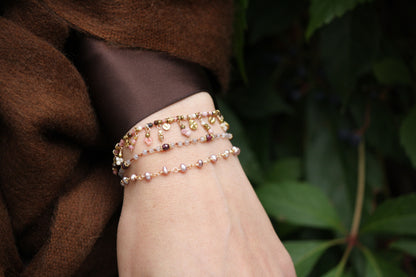 Shop handcrafted gemstone bracelets with Pink Jade, Moonstone, Lilac Amethyst & Champagne Pearls. Tarnish-free stainless steel. Available separately or as a stack!