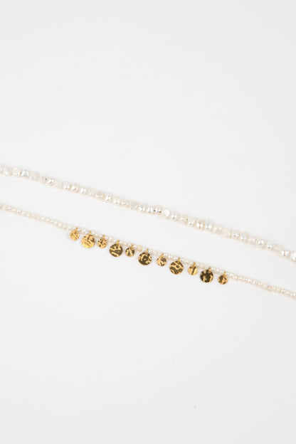 Look van 3 armbandjes met parel en maansteen